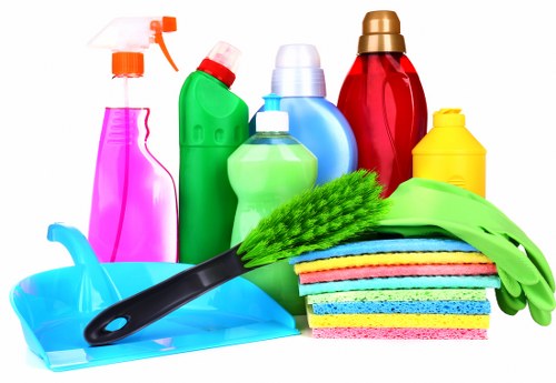 Professional carpet cleaner working in a Bromley family home