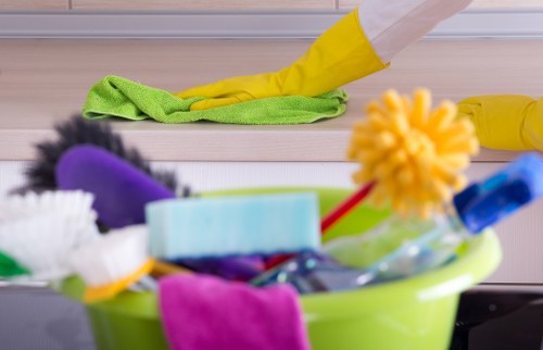 Professional office cleaners working in a Bromley business reception area