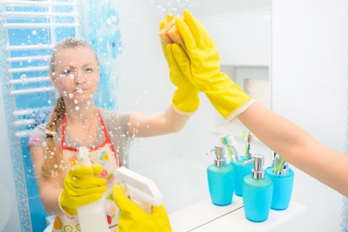 Cleaner treating stairs and hallway carpets in Bromley
